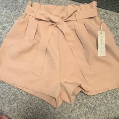 Beautiful Tan Shorts. Looks Great With A Blazer Or Just About Anything. They’re High Waisted. Feminine High-waist Beige Bottoms, Feminine Solid Color Bottoms For Day Out, Feminine Solid Bottoms For Day Out, Fitted Paperbag Waist Bottoms For Summer, Beige Feminine Short Bottoms, Feminine Beige Short Bottoms, Feminine High Waist Bottoms For Day Out, High Waist Feminine Shorts For Day Out, Tan Shorts