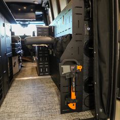 the inside of an rv with many storage compartments and tools in it's compartment