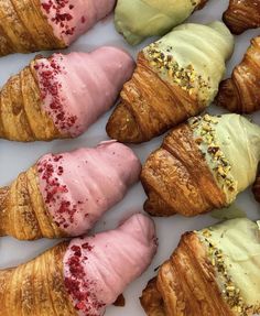 there are many croissants with different toppings on them