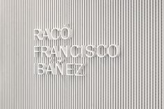 the words raco francisco and banez written in white on a striped wallpapered background