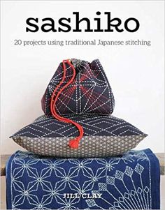 two bags sitting on top of each other with the title sashiko written in japanese