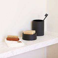 The Sabbia tumbler is part of a bathroom set designed for Oliver Thom by ESKO. An elegant and functional tumbler, it is perfect for holding toothbrushes in the bathroom or as a storage solution for everyday items around the house. Dimensions:  8.5cm Dia x10.5cm H  Material:  Stoneware with a matte exterior and contrasting gloss interior for a natural and textural feel. Matte Black Accessories, Vanity Bathroom, Reusable Tumbler, Bathroom Set, Black Accessories, Everyday Items, Bathroom Sets, Simple Elegance, Tumbler Cups