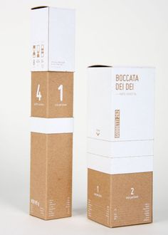 three cardboard boxes stacked on top of each other with the number one printed on them