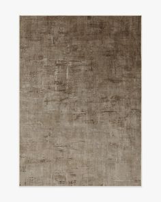 an area rug with brown and beige colors