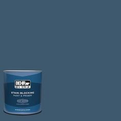 behr ultra stain - blocking paint and primer in dark blue, with white trim