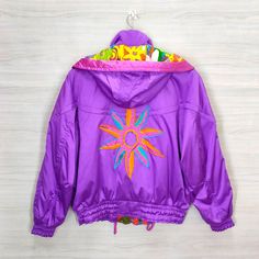 90s Style Hooded Spring Windbreaker, 90s Hooded Windbreaker For Spring, 90s Hooded Spring Windbreaker, Purple Hooded Track Jacket For Sports, 90s Style Hooded Track Jacket For Winter, 90s Hooded Track Jacket For Winter, 90s Style Hooded Winter Track Jacket, 90s Hooded Winter Track Jacket, Casual Hooded Windbreaker For Skiing