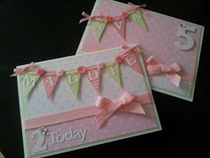 two birthday cards with pink bows and buntings on them, one has the number five