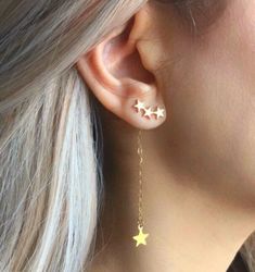 v Party Drop Earrings With Star Charm, Dangle Earrings With Star Charm, Dangle Earrings With Star Charm For Party, Dainty Star Charm Drop Earrings, Dainty Star Charm Earrings, Elegant Star-shaped Jewelry With Dangling Charms, Gold Star-shaped Dainty Earrings, Trendy Star-shaped Single Earring, Rose Gold Star Charm Earrings