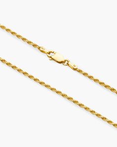 Unveiling our thinnest and sleekest Rope Chain to date, the 1.5mm design adds a touch of understated elegance to any outfit. Meticulously crafted from 925 sterling silver bonded in 14k gold, this chain offers a perfect blend of durability and finesse. Elevate your daily style effortlessly, with the added assurance of exceptional craftsmanship and unbeatable value, all under $100. JAXXON 1.5mm Rope Gold Chain | 22" Classic Link Rope Chain Necklace For Formal Occasions, Elegant 14k Gold Tarnish Resistant Rope Chain Necklace, Classic Rope Chain Necklace With Delicate Link, Minimalist Rope Chain Link Jewelry, Classic Rope Chain Necklace As Gift, Minimalist Yellow Gold Rope Chain Jewelry, Classic Yellow Gold Adjustable Rope Chain Necklace, Classic 14k Gold Rope Chain Necklace With Delicate Chain, Classic Yellow Gold Rope Chain Necklace For Everyday