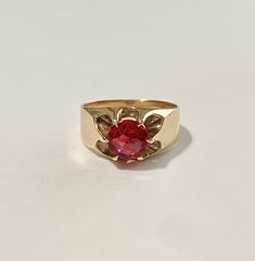 Beautiful antique 1900s Edwardian era 10k rosy yellow gold created ruby ring! This pretty antique ring is set with a created rubygemstone that weighs approximately 1.28CT. Lovely piece of early 1900s era jewelry ERA - Circa early 1900s / Edwardian Era METAL / MATERIAL - 10k rosy yellow gold, created ruby -( approximately 1.28 cts ) MARKINGS / HISTORY - marked inside the band - 10k OB (Osbty Barton) SIZE / MEASUREMENTS - Size: 9 3/4, Created Ruby measures 7 mm, Ring Head Height: 4.8 mm, Back of s Edwardian Engagement Rings, Round Diamond Solitaire Ring, Yellow Sapphire Ring Engagement, Yellow Gemstones, Diamond Solitaire Ring, Natural Diamond Ring, Antique Ring, Red Band, Edwardian Era