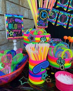 colorful party supplies are displayed on a table