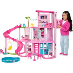 Kids can host the ultimate pool party with the Barbie Dreamhouse! This deluxe doll house has the tallest slide in the Barbie Dreamhouse series to date, with a three-story spiral design for endless fun in the sun. It inspires 360-degree play with a wide and spacious floorplan, three levels, and 10 indoor and outdoor living areas. The playset also features more pet-friendly touches than ever before, including a puppy slide and pool where furry friends can play along with Barbie doll! Plus, the top Dreamhouse Barbie, Barbie Dreamhouse, Barbie Doll House, Play Areas, Puppy Play, Barbie Dream, Barbie House, Barbie Dream House, Spiral Design