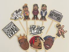 a bunch of stickers that are on top of a white surface with the words hip hop