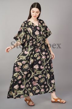 Casual Black V-neck Kimono, Black Bohemian Maxi Length Kimono, Bohemian Black Printed Kimono, Black Maxi Dress For Spring Loungewear, Black Maxi Dress For Summer Loungewear, Spring Black Maxi Dress For Loungewear, Black Bohemian Tunic Kimono, Black Printed V-neck Kaftan, Black Long Kaftan For Beach Season