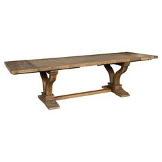 an old wooden table with two legs and a long slab on the top, against a white background