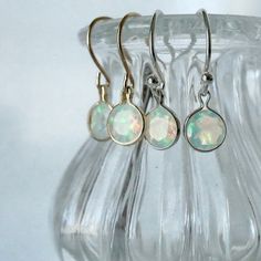 Opals are like calcified bubbles. Light dances around them in the colors of the ocean. Give yourself something special this year with ready-to-ship jewelry. These earrings are 100% bragworthy. #jewelluxe #jewelluxeco #madeinamerica #showmeyourrings #alternativebride #shesaidyes #futureheirlooms #engagementring ⁠#weddinginspo #gemstonerings #ringsofinstagram #saltandpepper #uniquerings #gemologue #modernbride #jotd #rotd #saltandpepperdiamonds #americanmade Ethiopian Opal Earrings, Earring Frame, Earrings Casual, Earrings Opal, Dangle Earrings Gold, Opal Earrings, Gold Earrings Dangle, Blue And Pink, Opal Jewelry