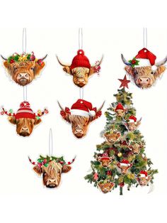 a christmas tree decorated with ornaments and bull heads hanging from it's sides in front of a white background