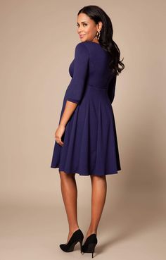 Cut to flatter throughout your pregnancy and after baby arrives too, the gently tailored shape of our Sienna Maternity Dress drapes beautifully over your curves with a soft panelled Ponte Roma skirt and neat princess seams to the bust. A classy and chic look that’ll never go out of style, this smart maternity dress in stylish navy blue is the perfect desk to dinner dress for your maternity wardrobe. Premium Ponte Roma fabric Classic fit and flare shape Soft paneled skirt for structure and a flat Elegant Fitted V-neck Maternity Dress, Elegant Nursing Friendly V-neck Dress, Elegant Long Sleeve Maternity Dress, Elegant Fit And Flare Dress With Empire Waist, Solid Dress With Fitted Bodice And Flattering Silhouette, Modest Fitted Empire Waist Dress, Elegant Empire Waist Midi Dress, Elegant A-line Dress With Princess Seams, Classic Dress With Fitted Bodice And Empire Waist