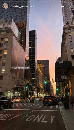 a city street filled with lots of tall buildings