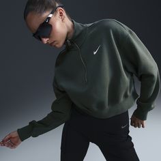 Grounded in style, comfort and versatility, meet our take on luxury loungewear. This 1/2-zip sweatshirt is cropped for a trend-right look, while taller ribbing at the hem, cuffs and collar adds structure to the overall fit. Made from midweight fleece, it's sure to be one of your new cold-weather favorites. Spring Half-zip Athleisure Sweatshirt, Sporty Half-zip Streetwear Tops, Sporty Half-zip Sweats For Loungewear, Sportswear Half-zip Loungewear Sweatshirt, Sporty Half-zip Tops For Streetwear, Half-zip Sportswear Sweatshirt For Loungewear, Half-zip Loungewear Sweatshirt In Sportswear Style, Spring Sportswear Half-zip Tops, Half-zip Sportswear Tops For Spring