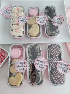 valentine's day treats in plastic containers on a table