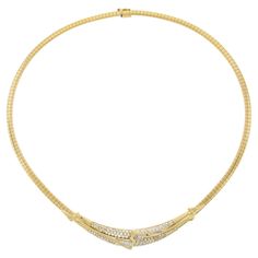 This bold, estate Italian diamond necklace is very well crafted in 18k yellow gold and features approximately 1.85 carats of the finest quality round brilliant & baguette cut diamonds. The diamonds are on FIRE! They are truly brilliant stones with amazing clarity and beautiful color which reflect remarkable brilliance and shimmer throughout. A statement necklace that will sure add a glamour to your look! Enjoy :) --Stone(s):-- Numerous Natural Genuine Diamonds - Round Brilliant Cut - Pave Set - VS1/VS2 Clarity - G/H Color - 1.50ctw (approx.) (10) Natural Genuine Diamonds - Baguette Cut - Channel Set - VS1-SI1 Clarity - I-K Color - 0.35ctw (approx.) Total Carat Weight: 1.85 (approx.) Material: Solid 18k Yellow Gold Weight: 43.60 Grams Center Piece Width: 81.8mm (3.2") (east to west) Center Baguette Cut Diamond, Baguette Cut, Baguette Diamond, Link Necklace, On Fire, Round Brilliant, Karate, Beautiful Colors, Diamond Necklace