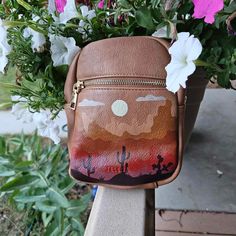 Hand-Painted Western Sunset Landscape Crossbody Purse Bag Painting Leather Purse Diy, Hand Painted Crossbody Travel Bag, Hand Painted Crossbody Bags For Travel, Artistic Hand Painted Crossbody Shoulder Bag, Purse Painting Ideas, Painting On Leather Bags, Leather Purse Diy, Clothing Painting, Painted Purses