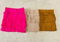 This might be one of the most fun and cutest items I have made! I am in love with this adorable fringe skirt! Super easy to match with any color top! If you prefer to have the skirt made with your own measurements, please submit them under the (personalization) box. To complete your look, checkout our best selling fringe vest! https://www.etsy.com/listing/933521007/jannis-fringe-faux-suede-vest-baby-suede?click_key=1eb5d1300078fc1fc0bc2132de39d885390e93d5%3A933521007&click_sum=5e01bf34&ref=shop_ Fringe Skirts, Kids Fringe, Girls Fringe, Fringe Mini Skirt, Suede Fringe Skirt, Western Skirts, Faux Suede Vest, Tassel Skirt, Mock Neck Shirt