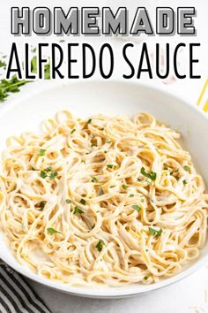 homemade alfredo sauce in a white bowl with parsley on top and text overlay