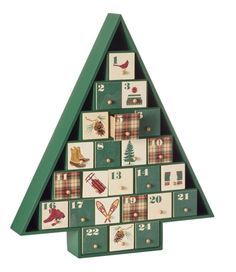 a christmas tree made out of wooden blocks with numbers and symbols on the sides,