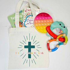 a tote bag filled with toys and books