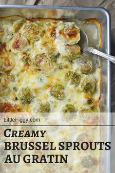 a casserole dish with broccoli and cheese in it on a table