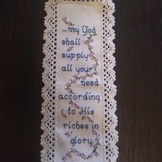 a cross - stitch bookmark with the words, my god shall supply all your need to live in glory