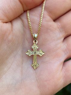 Beautiful 14k yellow gold  cross pendant.  Material: 14k solid yellow gold. Length: Approximately 1 inch long. Width: Approximately .25" wide. Weight: Approximately 1.3 grams.  Comes in a nice box. *Chain is sold separately. Chain typically weighs 5-7 grams depending on length chosen. It is a 14k gold Miami Cuban 2mm. Gold Crucifix Jewelry Stamped 14k, Gold Crucifix Cross Necklace With Polished Finish, Gold Crucifix Necklace With Polished Finish, Yellow Gold Polished Cross Necklace Pendant, 14k Gold Crucifix Jewelry, 14k Gold Cross Necklace For First Communion, 14k Yellow Gold Crucifix Jewelry, 14k Gold Crucifix Hallmarked Jewelry, 14k Gold Hallmarked Crucifix Jewelry