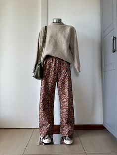 Vintage 90s floral trouser Pant baggy fit with elastic waist Without pockets Cozy fit different sizes from S to L Cotton fabric with floral pattern on burgundy base Perfect for spring-summer Vintage in great condition The mannequin in the photo is 1.68 cm and wears an International XS/S Measurement in cm: waist with elastic, fits different sizes from S to L Length 108 cm NO RETURNS: Please pay attention, Sputnik is a sustainable shop which is why we do not accept returns. For the sake of the env Oversized Pant, Sustainable Shop, Wardrobe Planner, 90s Baggy, Floral Trousers, 90s Floral, Baggy Trousers, Fall Winter Wardrobe, Summer Vintage