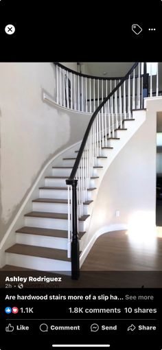 a white staircase with black railing and handrails in a house on instagram