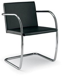 a black chair sitting on top of a metal frame