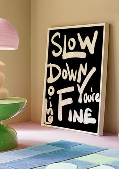 a sign that says slow down and if you're fine