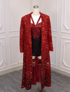 a mannequin wearing a red sequin duster