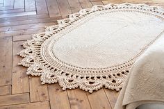 a round rug on the floor in a room