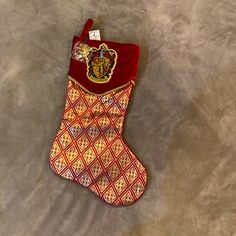 harry potter christmas stocking with hogwarts crest on it