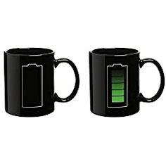 two black coffee mugs with the same color battery on them, one is green