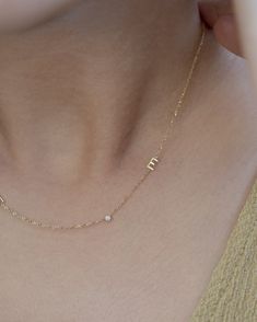 Personalized Asymmetrical 14k solid gold initials necklace with small diamond bezel.Simple, minimalist everyday necklacePerfect wearing alone or layering with your favorite necklaces.• Letter measures approx. 4.8mm• Material: Available in 14K Yellow Gold or 14K White Gold• Diamond: 0.03ct. VS Clarity F-H color * Leave us your initial and placement in the comment box at checkout. White Gold Initial Necklace, Necklace With Small Diamonds, Necklace With Initials Letters, Dainty Gold Initial Necklace, Necklaces With Initials, Gold Necklace With Initials, Tiny Initial Necklace, Gold Letter Necklace Initials, Diamond Letter Necklace