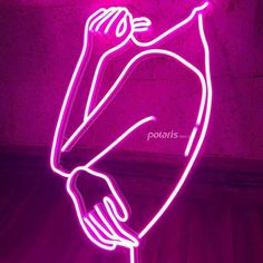 a pink neon sign with a man's torso