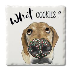 a brown dog with sprinkles on it's nose and the words what cookies?