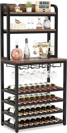 the wine rack has many bottles and glasses on it