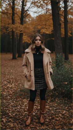 Get your fall outfit inspo right here! Discover the perfect cozy look for autumn with this stylish ensemble featuring a plush teddy coat, a chic plaid skirt, classic black turtleneck, and striking brown knee-high boots. Ideal for those crisp fall days, this outfit combines comfort and style seamlessly. For more trendy fall outfits and fashion tips, visit our site now! Elevate your fall wardrobe with this seasonal essential. Don't miss out - stay fashionable this fall with our expert advice!#Fashion #FallFashion #FallOutfitInspo #AutumnStyle #CozyLook #FallTrends #OOTD #StyleInspo #FashionInspo Coat Boots Outfit, Knee High Boots Outfit Work, Knee High Brown Boots Outfit, Brown Knee High Boots Outfit, Plaid Coat Outfit, Skirts And Boots, Brown Boots Outfit, Fall Boots Outfit, Brown Knee High Boots