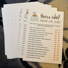 four question cards with the words guess who mom or dad