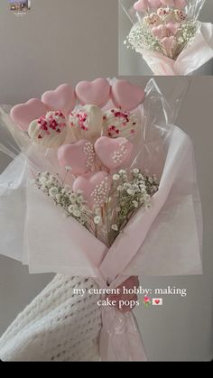 a bouquet of pink and white heart shaped candies