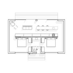 the floor plan for an office with two desks